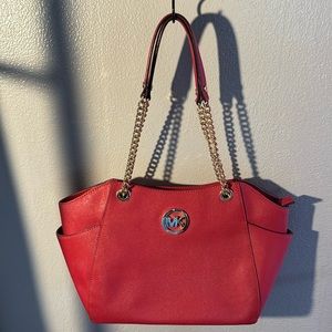 Michael Kors Jet Set Bag in Cherry with beautiful gold hardware.